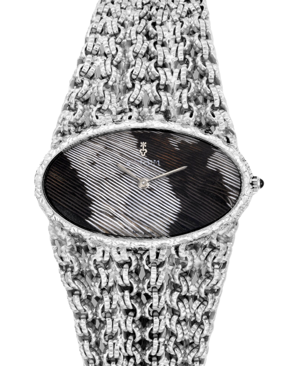 The Quirky Backstory of Corum's Peacock Feather Dial-fin