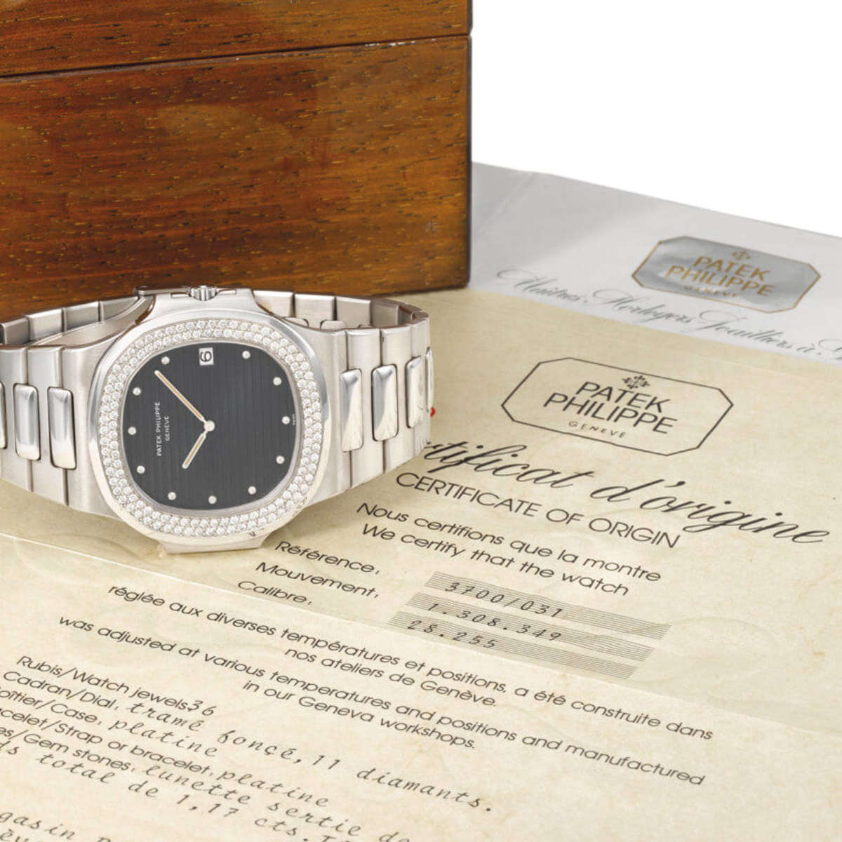 Patek Philippe Nautilus Ref.3700/031 in platinum set with 128 Top Wesselton Pure diamonds, sold for CHF 631,500 (lot 322, est. CHF 500,000-800,000)